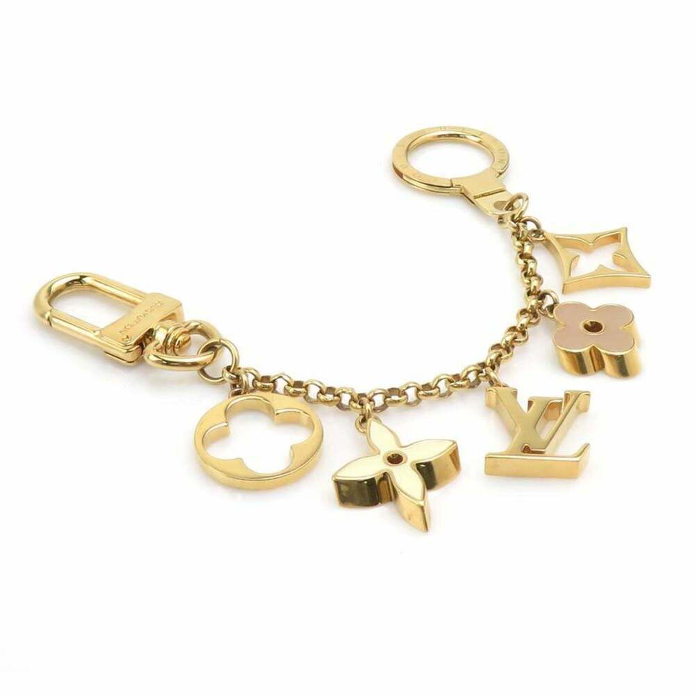 LOUIS VUITTON Cream Monogram Bag Charm